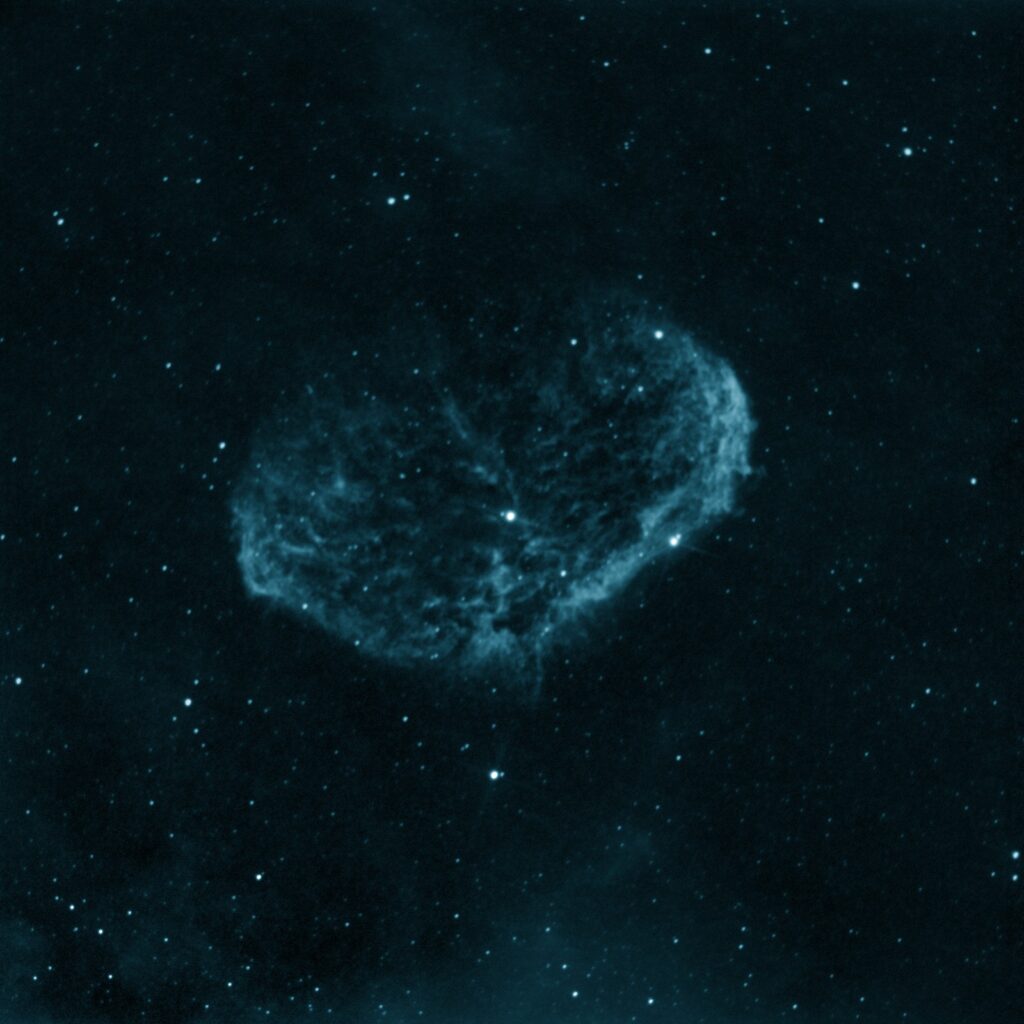 NGC 6888, the Crescent Nebula, in OIII narrowband — 2h21m with a Sky-Watcher 200PDS and ToupTek ATR533M mono camera